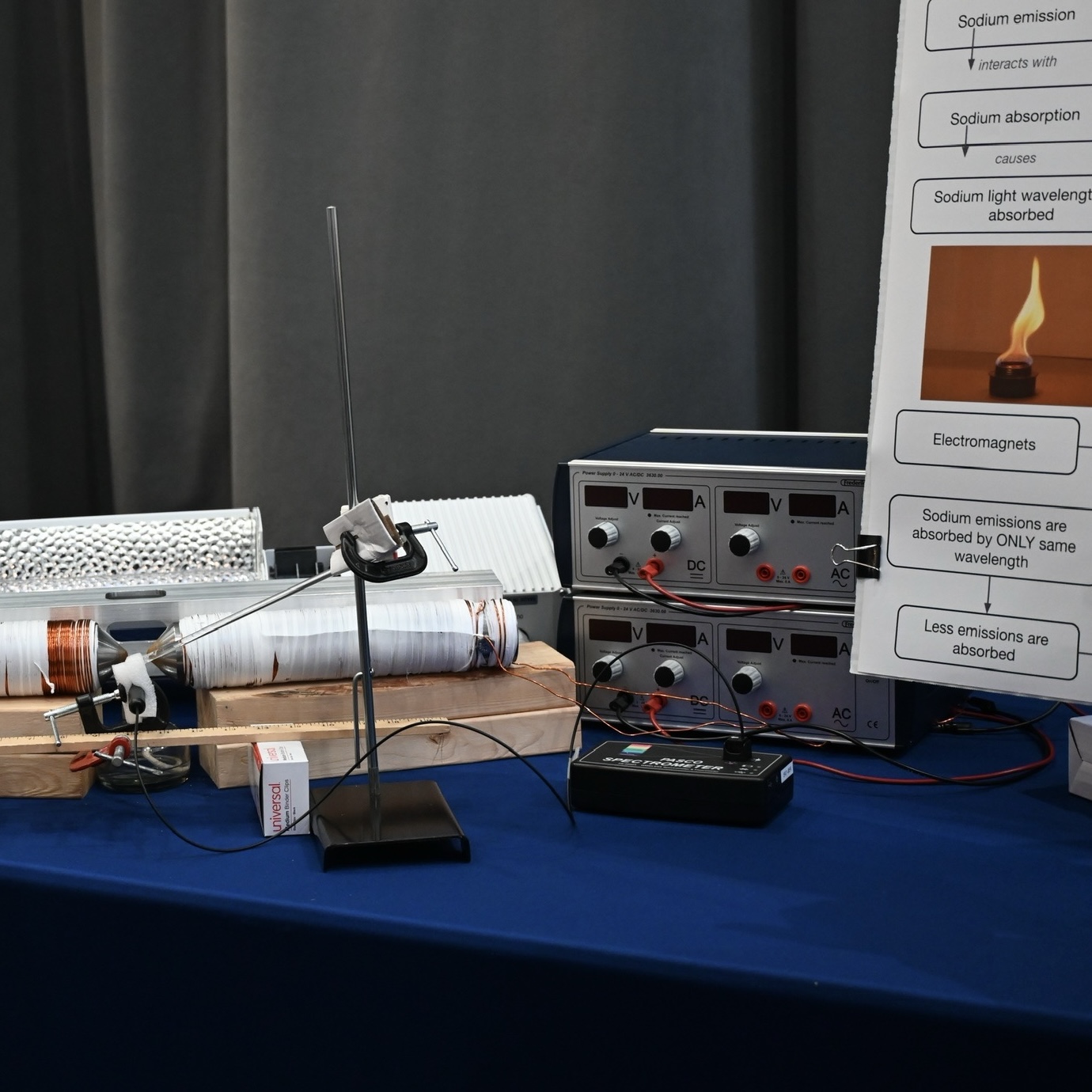 A student presenting their engineering project to visitors