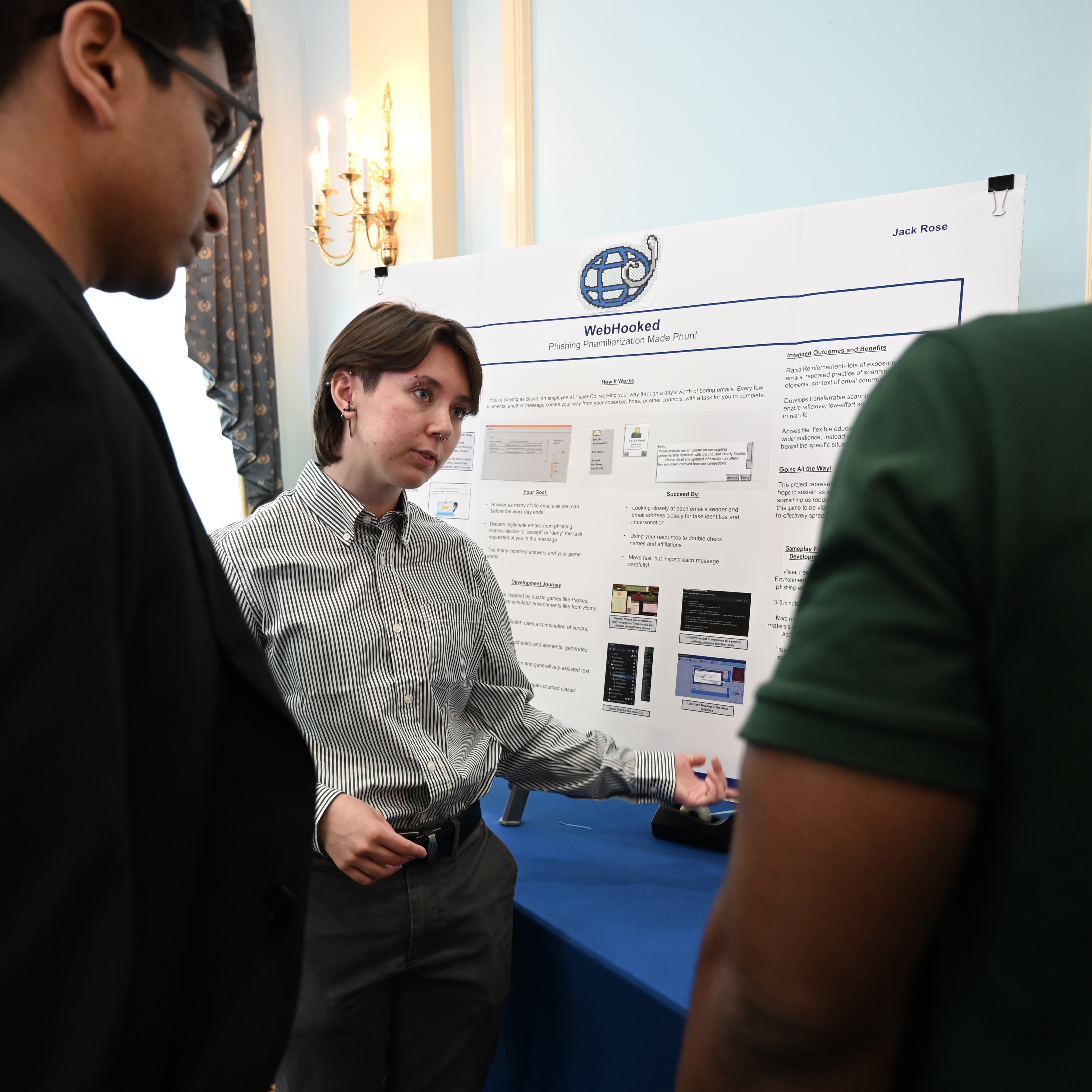 Wide view of the Capstone Fair floor with project displays and visitors
